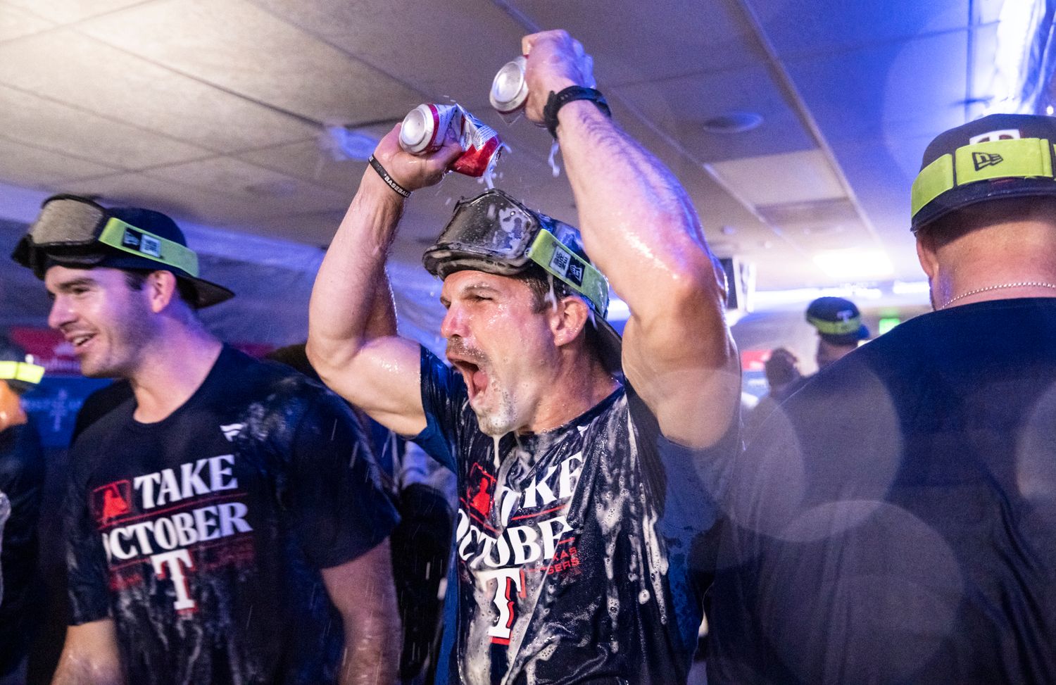 Sep 30, 2023; Seattle, Washington, USA; Texas Rangers celebrate in the clubhouse after clinching a post-season berth against the Seattle Mariners at T-Mobile Park. Mandatory Credit: Stephen Brashear-USA TODAY Sports  